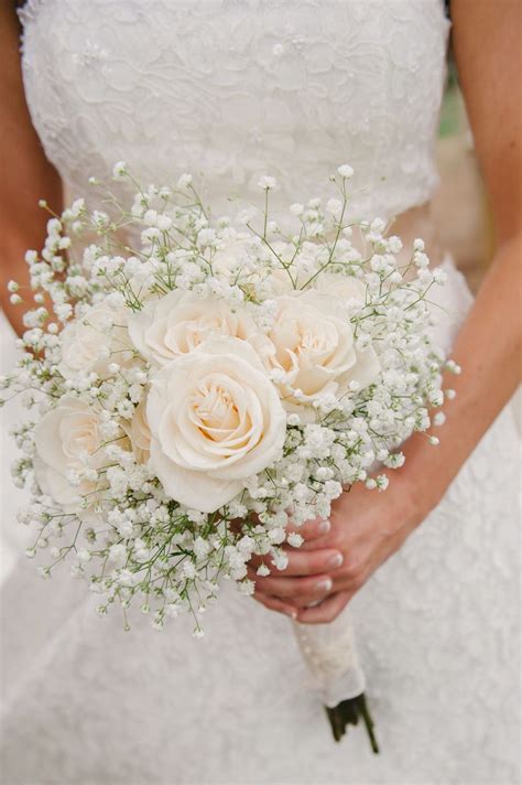 A Simple Bouquet Of Ivory Roses And Babys Breath Photo Via Project