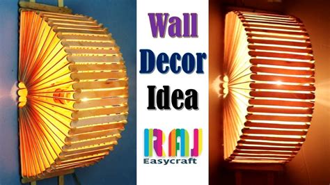 As decorative elements the contrast of dark and light areas gives definition to the object. Ice cream stick Wall decor idea || ice cream stick lamp ...