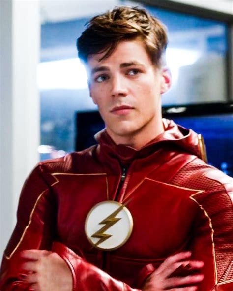 The Flash Standing With His Arms Crossed