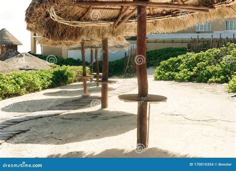 Thatched Hut On A Stretch Of Beach Overlooking The Caribbean Sea Stock
