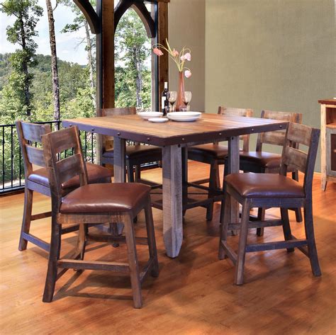 Complete your dining set with the log dining/side chairs and captains chairs (sold separately) for a one of a kind look that signifies your love for the rustic lifestyle. 900 Antique 52" Counter Height Dining Table Set by ...