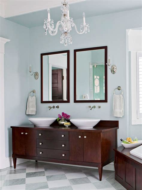 It should be placed 75 to 80 inches above the floor and, like all vanity lighting, contain at least 150 watts — ideally spread over a fixture that's at least 24 inches long so that the light will wash evenly over the hair and face. Bathroom Lighting Ideas | Better Homes & Gardens