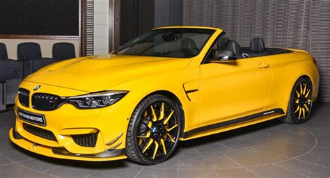 Service records included in the gallery detail some of the maintenance and repairs performed on this m4. BMW M4 Convertible With AC Schnitzer Mods Is So Very Yellow | Carscoops