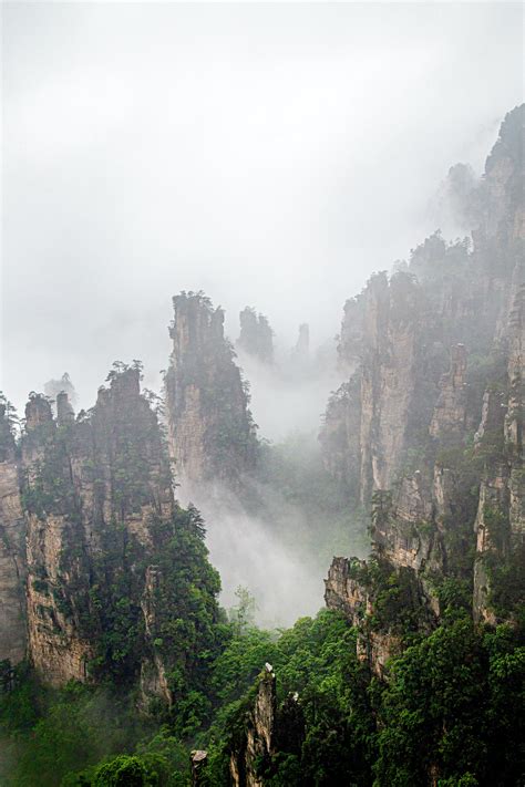 Aerial Shot Of Foggy Mountain · Free Stock Photo