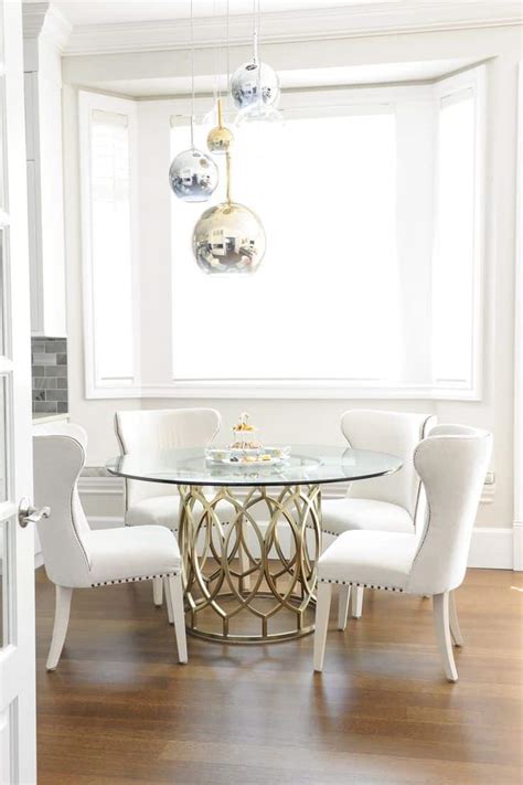15 Round Glass Dining Room Tables That Add Sophistication To Mealtime