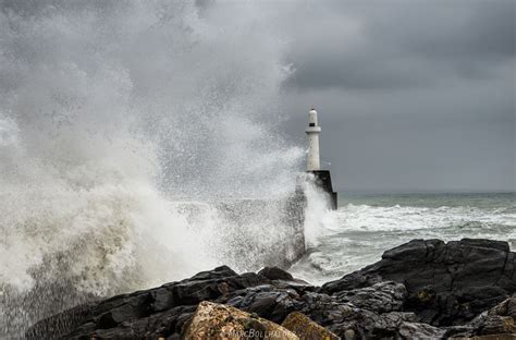 Stormy Sea With Lighthouse By Marc Bollhalder Via 500px