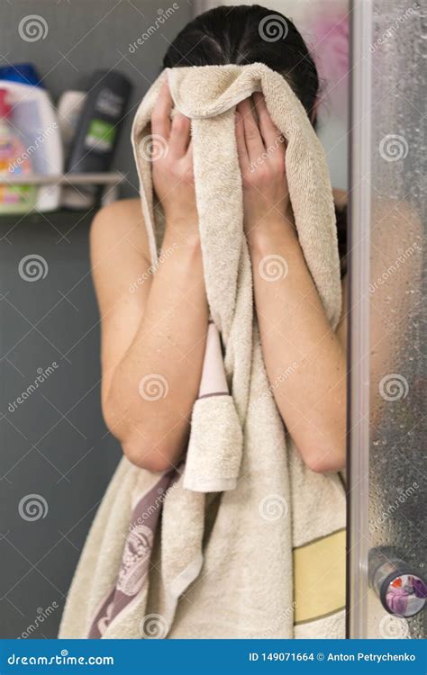 Young Woman Wipes After A Shower Woman Wiping Herself With Towel After