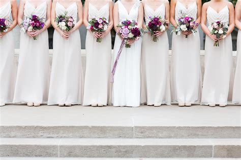 These champagne color bridesmaid dresses make every single moment of your big day feel special, thanks to little details that make a major impact. Champagne Bridesmaid Dresses and Black Groomsmen Tuxedos