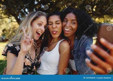 Portrait Of A Diverse Happy Smiling Young Beautiful Women Close Friends Having Fun And Taking