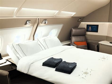 See Singapores A380 First Class Suite With Bed Armchair And Bathroom