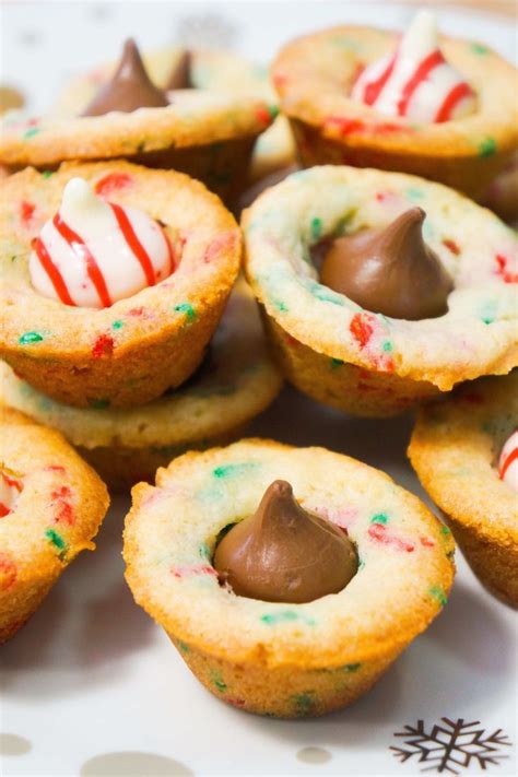 You'd better start early with your holiday. Mini sugar cookie cups filled with Hershey's Kisses ...