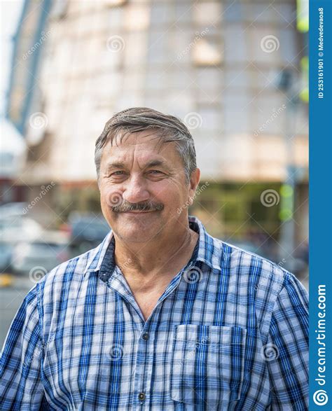 Gray Haired Elderly Man In Front Of A City Street A 70 Year Old Man Smiles Stock Image Image