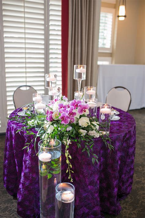 Purple Sweetheart Table With Orchids And Candles