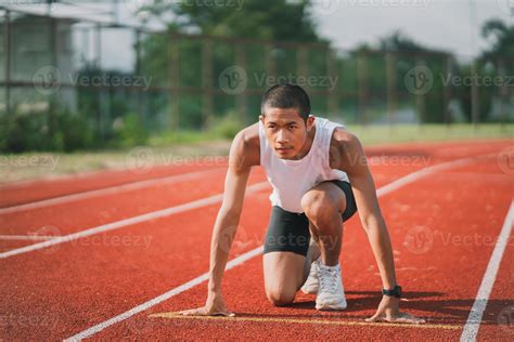 Hands Runner Ready Start To Run Athlete Sportman Training Run On Lane At The Stadium In Morning