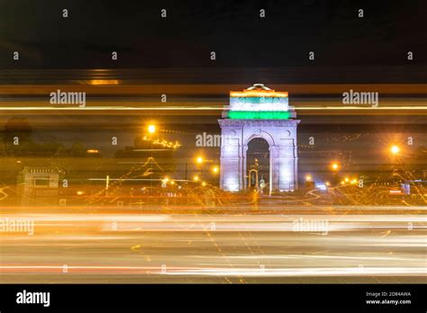 View Of Vehicle Light Trails At Night Infront Of The Iconic India Gate