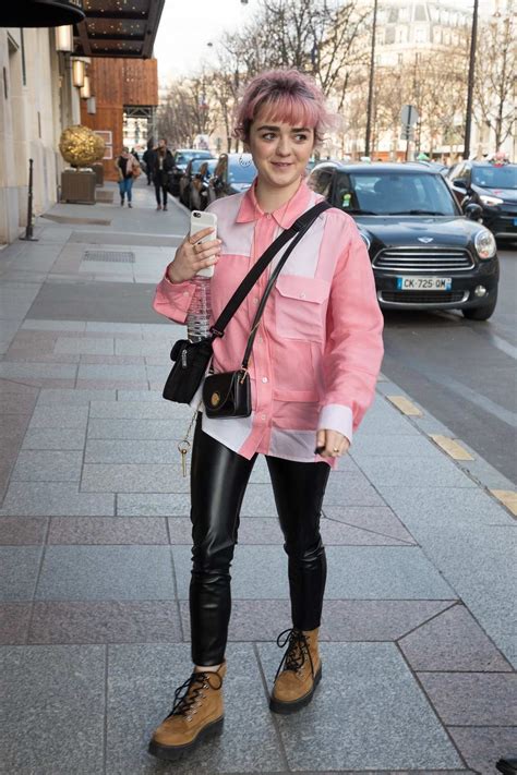 Maisie Williams Wears A Pink Shirt To Match Her Pink Hair While Out In