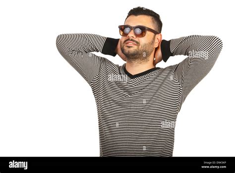 Relaxing Young Man With Sunglasses Standing With Hands To Nape Isolated