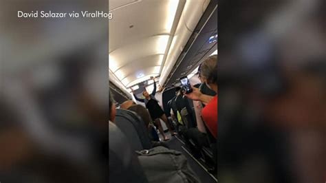 spirit airlines passenger removed from flight after becoming verbally abusive twerking on plane