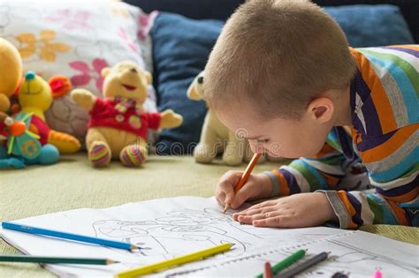 Little Child Boy Drawing With Color Pencils Children S Creativity