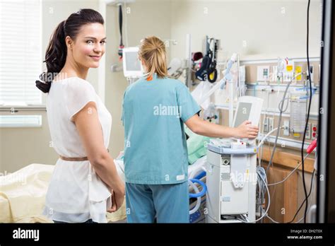 Nurse Examining Patient Hi Res Stock Photography And Images Alamy