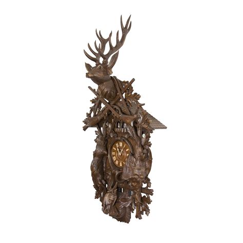 Carved Hunting Style 8 Day Musical Cuckoo Clock With Mounted Stag Head