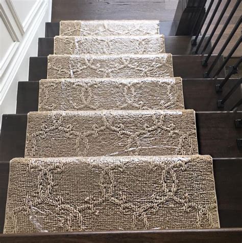 Patterned Carpet Runner On Dark Hardwood Stairs Staircase