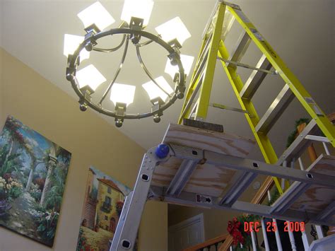 Last updated on may 23, 2015 by steve brielmaier | 0 comments. Replacing chandelier - Entry is 2 stories tall (phone ...