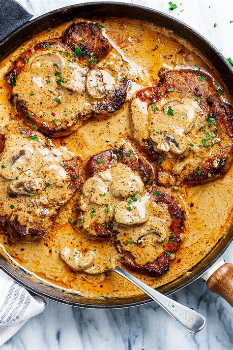 Mushrooms can be served on the side of almost any meat. Garlic Pork Chops Recipe in Creamy Mushroom Sauce - How to ...