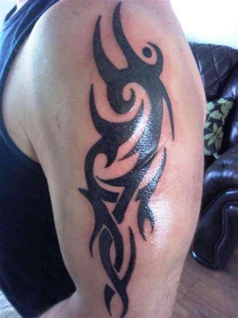 Bold Black Tribal Upper Arm Tattoo Pictures Fashion Gallery