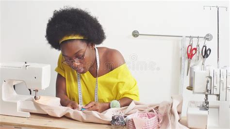 African American Woman Dressmaker Fashion Designer Engaged In His