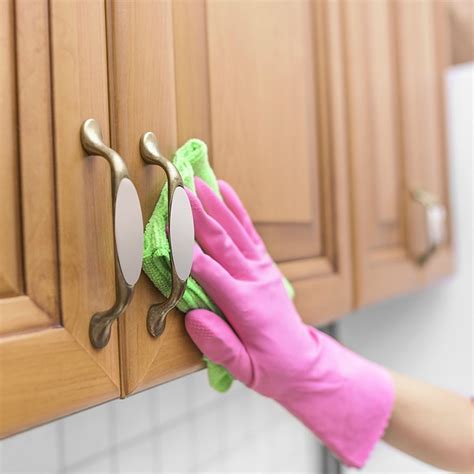 As a general rule, you should mix two cups of water with every cup of detergent. Best Natural Ways for Cleaning Wood Cabinets
