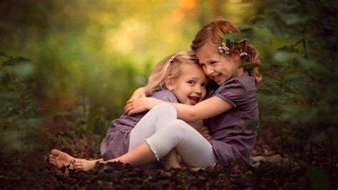 Little Girl Children Hugging Smiling Depth Of Field
