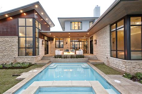 A Contemporary Home With Rustic Elements Connects To Its