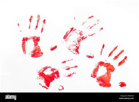 Four Red Handprints Against A White Background Stock Photo Alamy