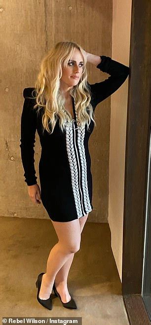 Rebel Wilson Shows Off Her Svelte Figure In A Fitted Black Mini Dress Following 35kg Weight Loss