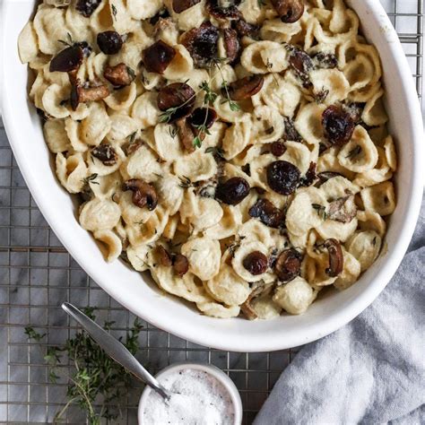 A delicious and elegant meal. Vegan Truffle Cream Pasta with sauteed mushrooms, thyme ...
