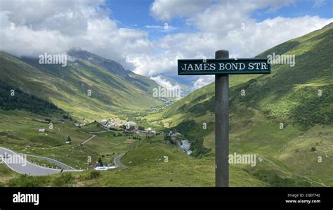 James Bond Str Sign Post With Beautiful Furka Mountain Pass On