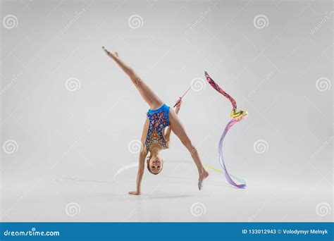 The Portrait Of Beautiful Young Brunette Woman Gymnast Training
