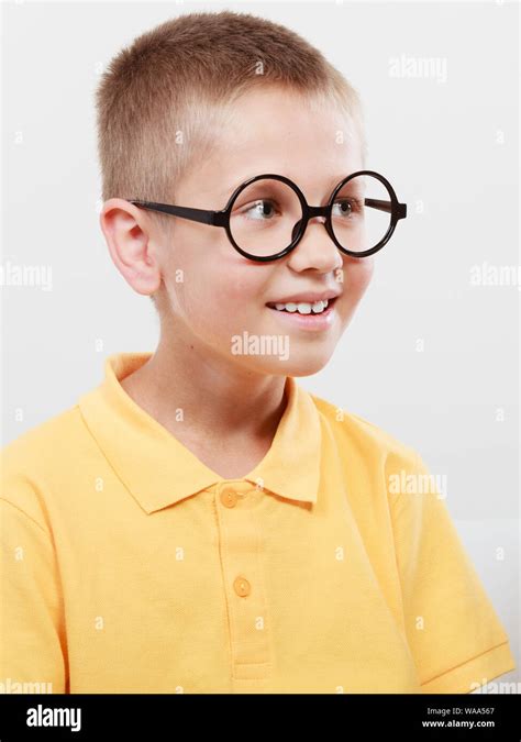 Portrait Close Up Of Cute Serious Kid Little Boy Nerd In Glasses Stock