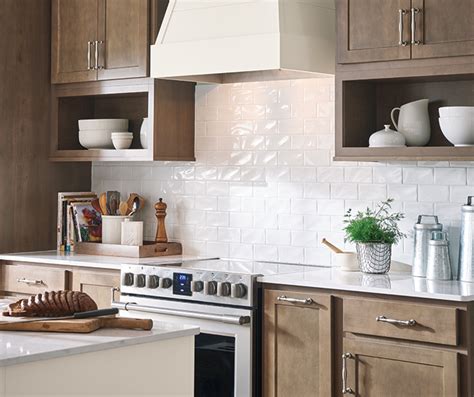 Birch kitchen cabinets with transitional styling paired with a saddle finish give this kitchen a casual, approachable feel. Casual Birch Kitchen Cabinets - Aristokraft Cabinetry