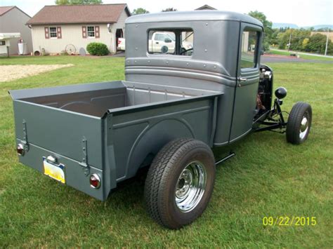 This is a later ford flathead v8, distinguishable by the number of head bolts: 1934 FORD HI BOY PICKUP TRUCK FLATHEAD HOTROD V8 VERY RARE ...