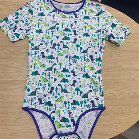 ddlg abdl adult onesie with a dinosaur pattern etsy