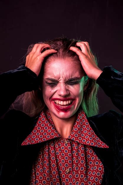 free photo desperate woman holding her head with hands