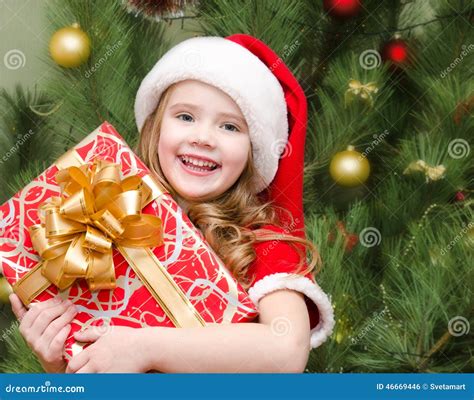 Happy Little Girl In Santa Hat With T Box Stock Photo Image Of