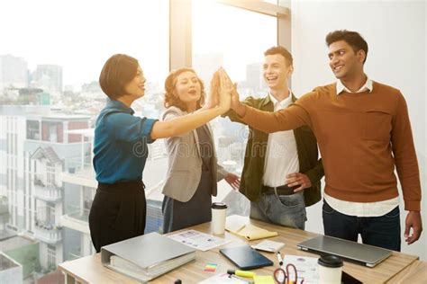 Business People Giving Each Other High Five Stock Image Image Of