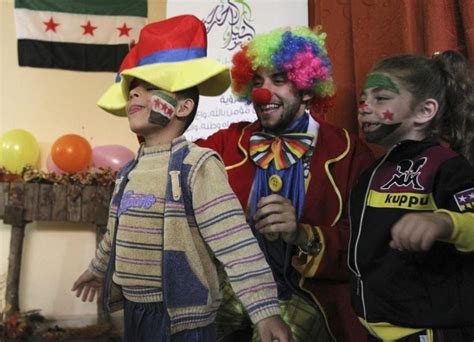 These Pictures Of Clowns Making Refugee Children Laugh Are Truly