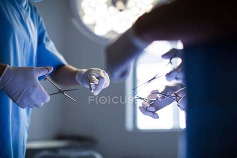 Group Of Surgeons Performing Operation In Operation Room At Hospital — Clinic Medical