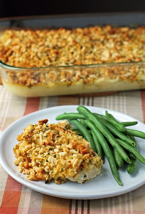 A short cut base with chicken and veggies is topped with stuffing and baked until bubbly. Cheesy Chicken and Stuffing Bake - Emily Bites
