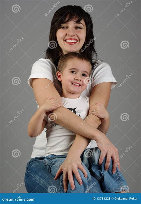 Mother Holds Her Son In Her Arms Stock Photo Image Of Positive Love