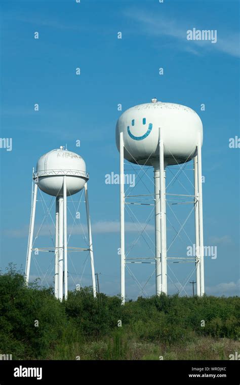 Elevated Steel Water Tanks With Smiley Face Near Bastrop Texas Stock